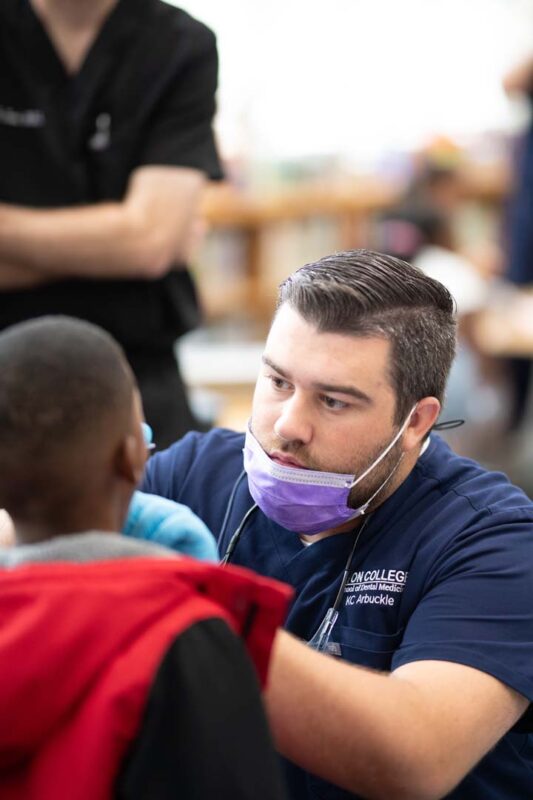 Lyon College dental students working on teeth