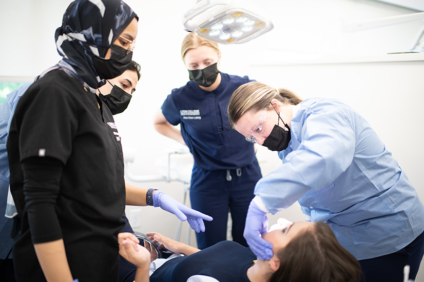 Lyon dental students working on a patinent