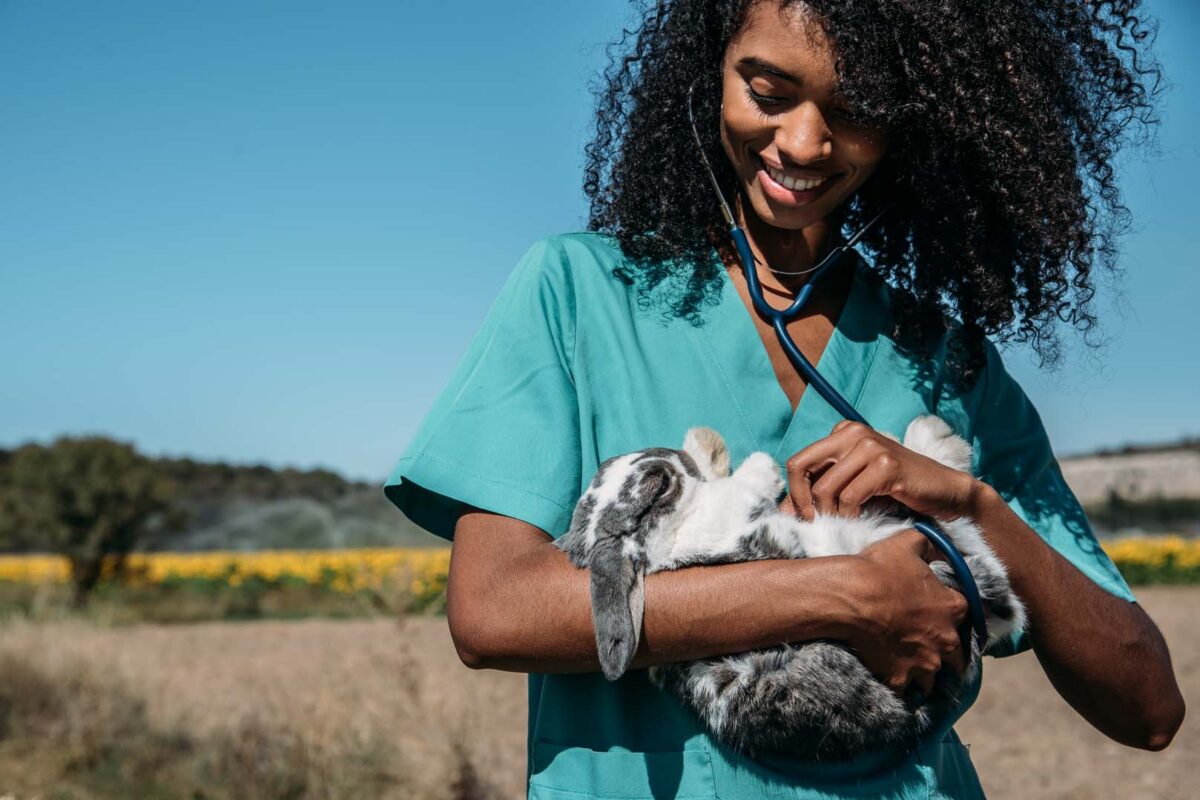 Vet student with goat